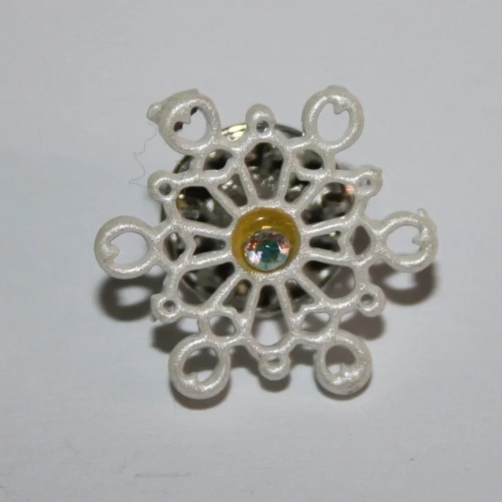 Beautiful white snowflake lapel pin .75